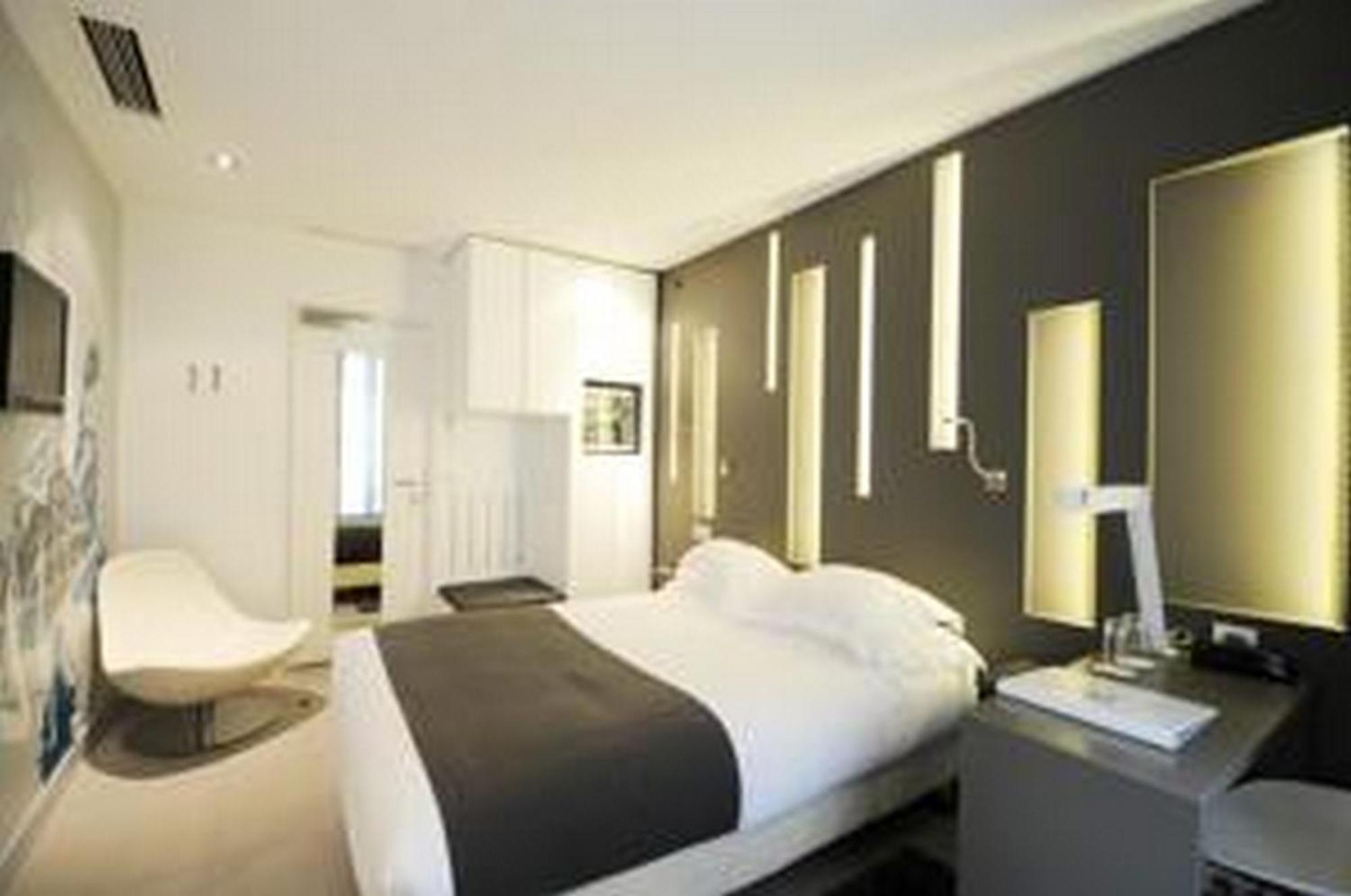 Arc De Triomphe Etoile Hotel Париж Стая снимка